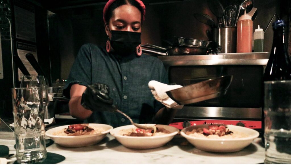 Executive Chef, Shennari “Greens” Freeman cooking